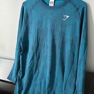 Two Men’s Gymshark long sleeve. XL worn once only. Sold together
